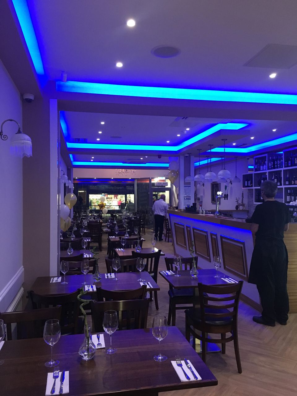 Kurdina Restaurant: completed dining room with cove lighting and set tables