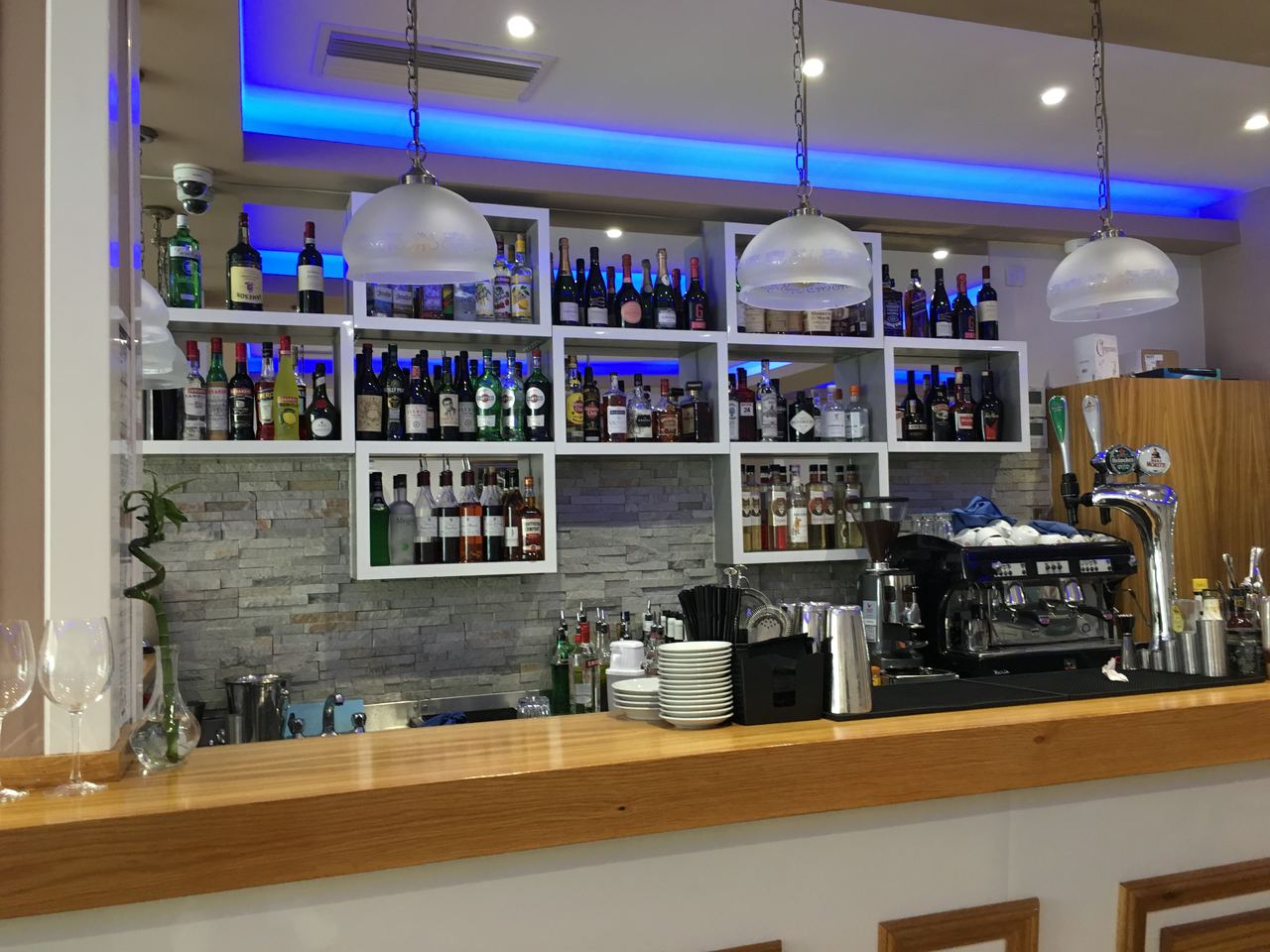 Kurdina Restaurant: fitted bar with backlit shelving and coffee station