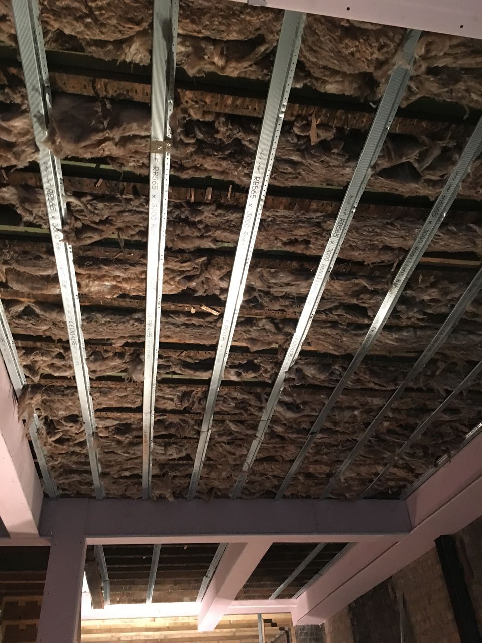Metal ceiling framing fixed up to the original structure.