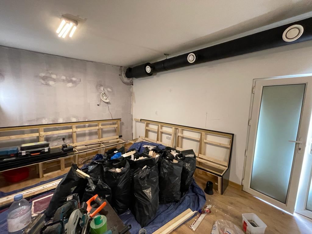 The unit stripped out and cleared ready for the new layout.