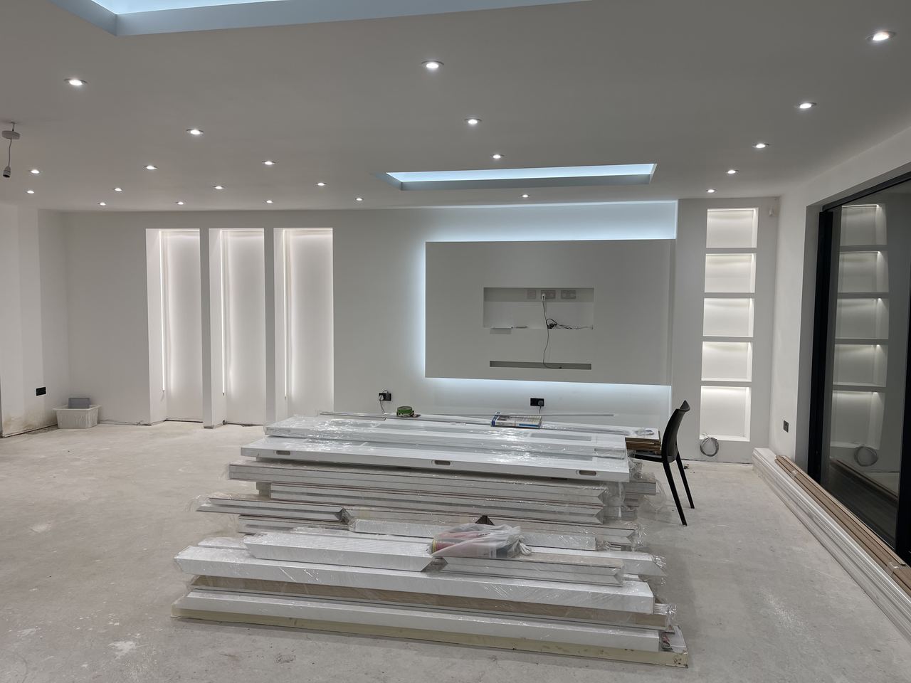 Extension, Loft Conversion & Summer House, open-plan living space with skylight and full-height glazing