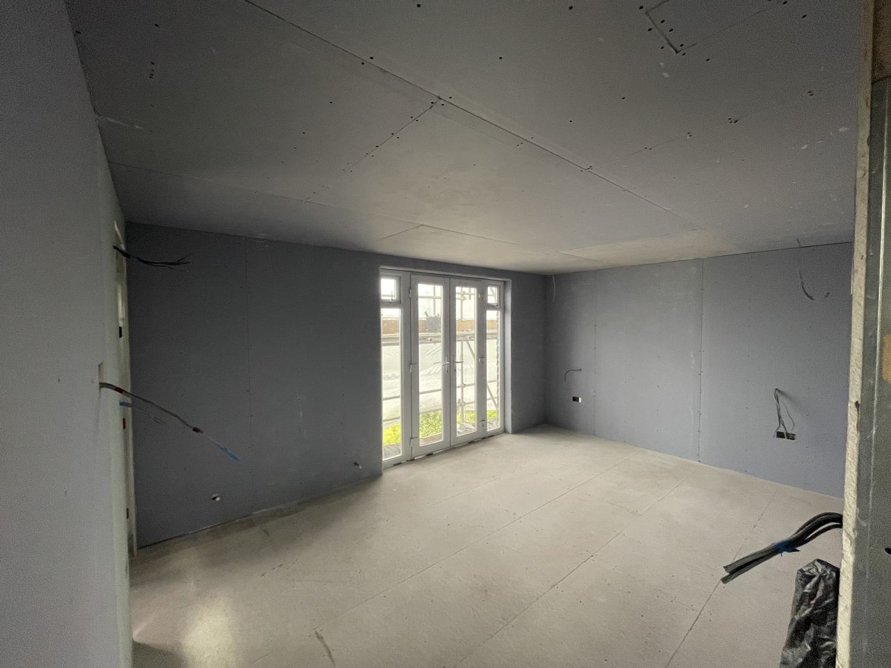 Extension, Loft Conversion & Summer House, plastered bedroom with new french doors