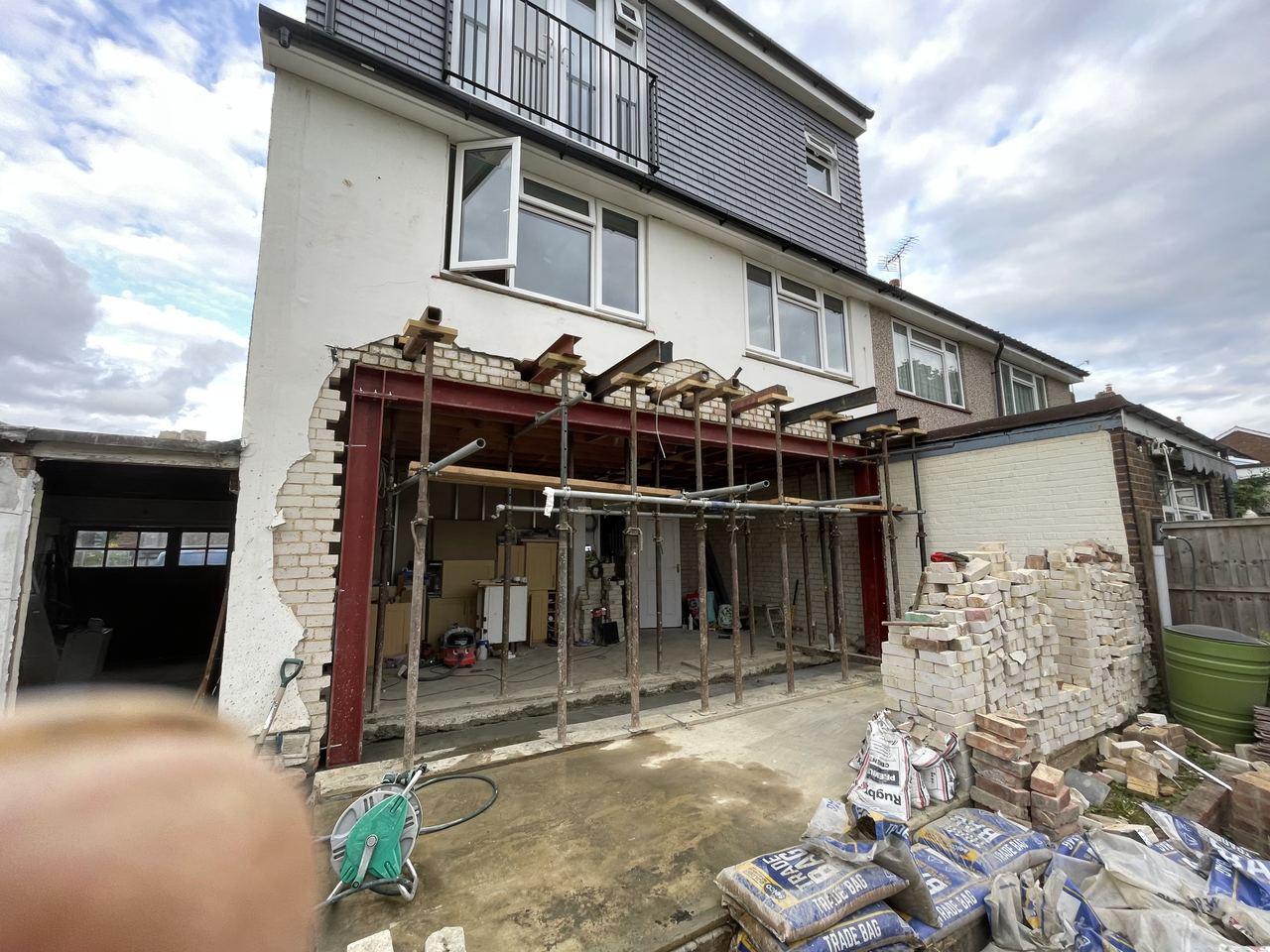 The original rear extension being demolished back to the house.