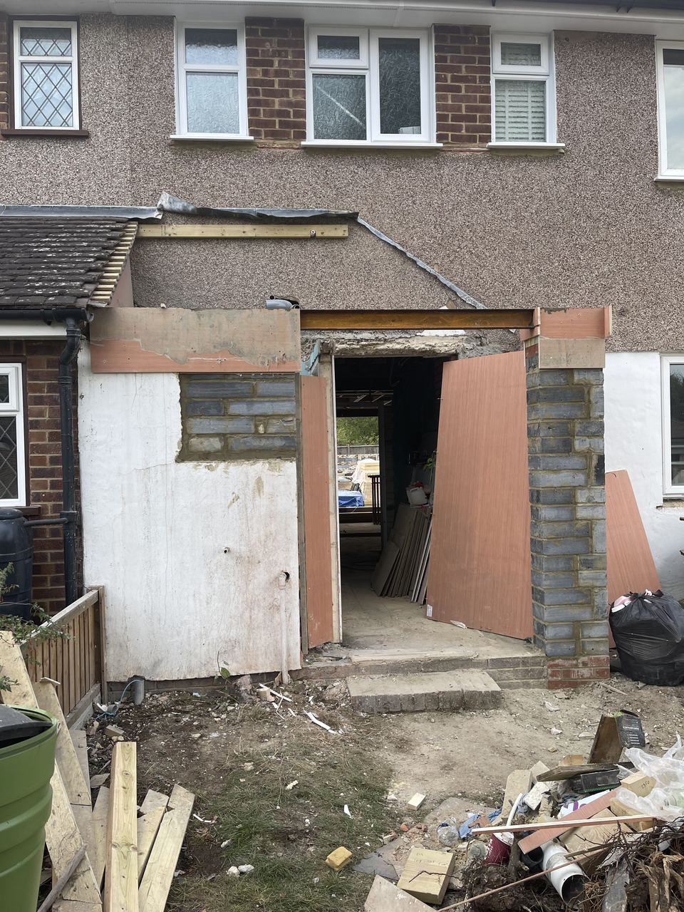 Rear elevation stripped and opened up for the new structure.