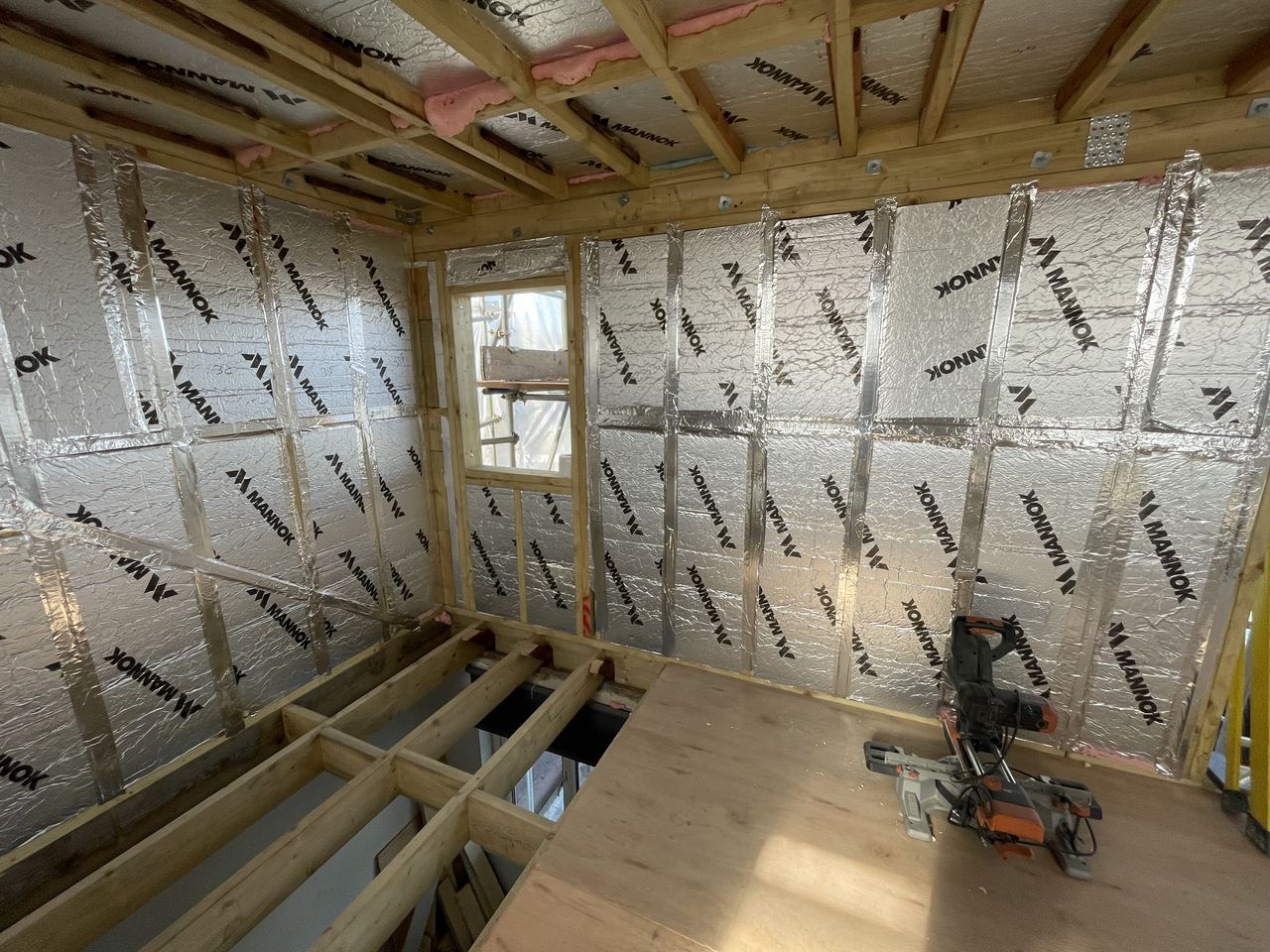 Insulated stud walls going up in the new loft rooms.