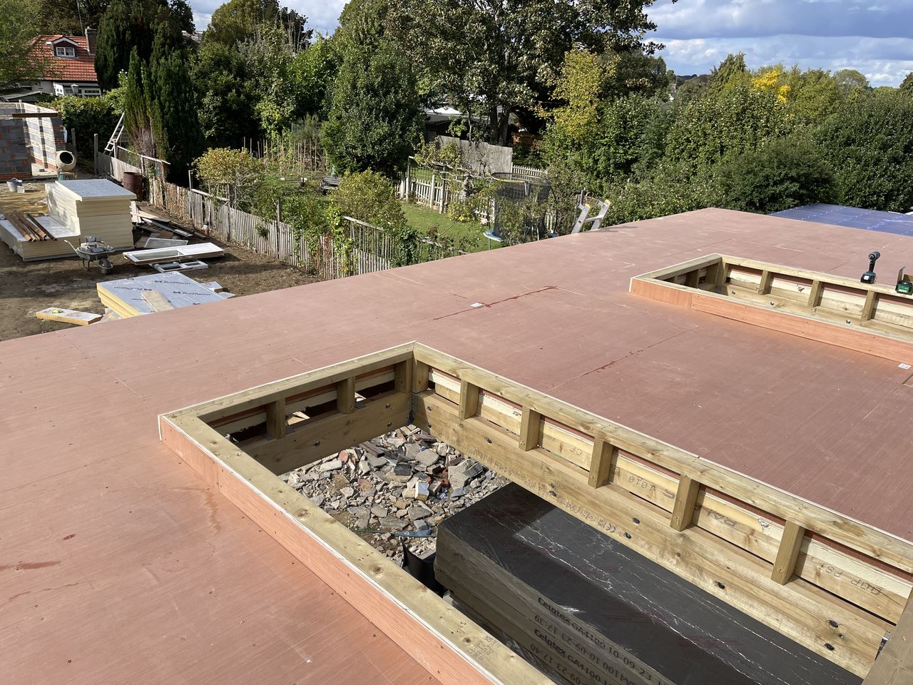 Timber-framed deck and structure for the garden summer house.