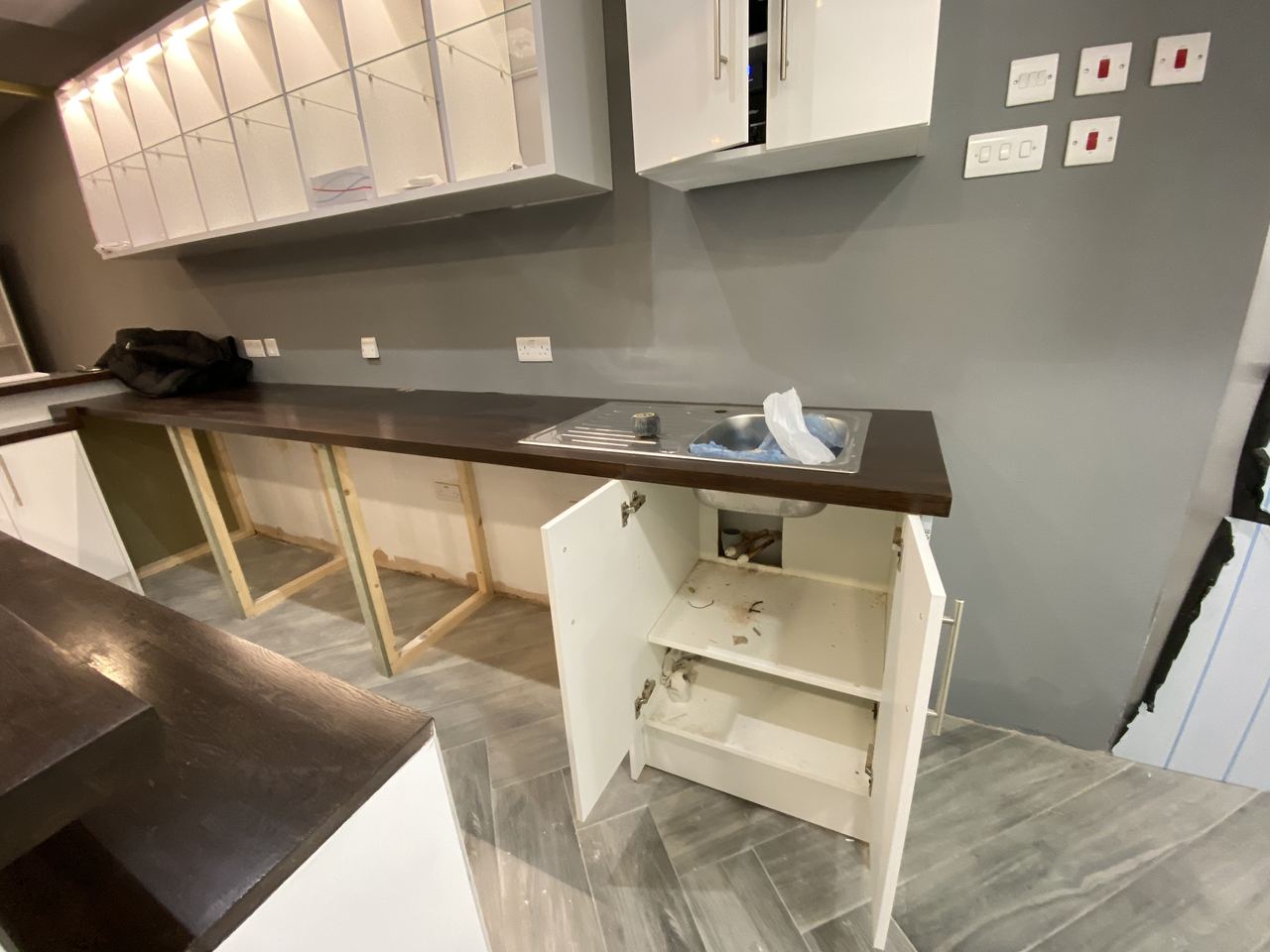 The servery counter and back fitting built on site.
