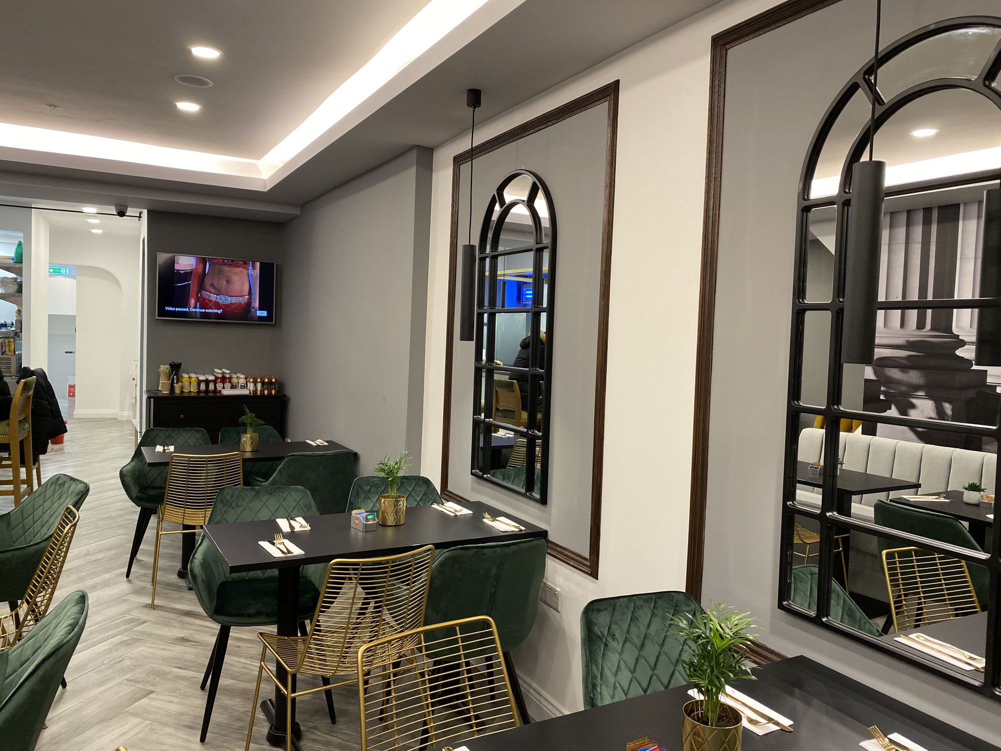 Wake Up Lounge: completed café interior with arched mirrors